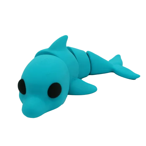 Blauw speelgoed dolfijn met grote zwarte ogen op een witte achtergrond.